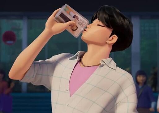 Close-up of an animated male character, appearing to be a teenager or young adult, with short black hair. He's wearing a light-colored, grid-patterned shirt over a pink undershirt and a thin gold necklace. He's tilting his head back and drinking from a plastic case that appears to contain a picture ID, possibly a driver's license or student ID. The background shows a blurred-out setting, suggesting an outdoor public space like a school or transit area. Other, less distinct animated figures are visible in the soft-focus background.